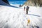 Couple alpinists mountaineers walking glacier  slopes. Mont Blanc