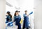 Couple as a professional cleaners in the bathroom