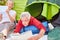 Couple as retirees on outdoor camping vacation