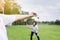 Couple asian women hand holding badminton racket and shuttlecock in public park,Close up