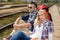 Couple backpack traveling resting on railroad trip