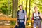 Couple backpacker hiking in forest pathway