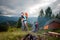 Couple backpackers standing near the campfire, tent, backpacks