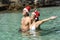 Couple bathing on the beach on christmas holidays