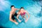 Couple bathing in swimming pool