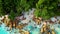 Couple on the beach of Anse Lazio Praslin island Seychelles,drone view from above at men and women