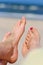 Couple at a beach - bare feet