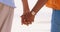 Couple, beach or holding hands outdoor for love and together on vacation or holiday. Closeup of man and a woman by