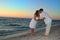 Couple on beach kissing