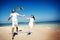 Couple Beach Kite Flying Getaway Holiday Concept