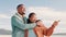 Couple, beach and pointing with smile for vacation, holiday or adventure with blue sky and freedom. Black people, man or