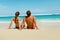 Couple On Beach In Summer. Romantic People On Sand At Resort