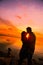 Couple on the beach at sunset silhouettes-Romantic summer