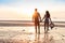 Couple On Beach At Sunset Summer Vacation, Beautiful Young People In Love Walking, Man Woman Holding Hands