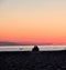 Couple at Beach Watching Sunset