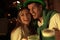 Couple with beer celebrating St Patrick`s day in pub