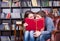 Couple Behind a Book Looking Each Other So Closed