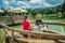 Couple biker dining outdoors on a lake after a bike tour around Lake Bloke in Nova Vas, Slovenia