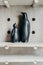 A couple black penguin figurine on wooden background. ceramic home decoration