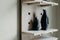 A couple black penguin figurine on wooden background. ceramic home decoration