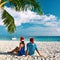 Couple in blue clothes on a beach at christmas