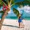 Couple in blue clothes on a beach at christmas