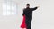 Couple, bonding and ballroom dancing in studio, performance practice or salsa learning class. Smile, happy or dancer man