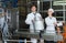 Couple bottling milk on manufacture