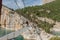 Couple in the bridge in  Montrebei gorge in Catalonia, Spain in summer 2020