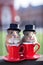 A couple of British hamsters fearing top hats. AI generative image.