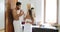 Couple Brushing Teeth In Bathroom, Dancing Cheerful Man And Woman Happy Smiling Doing Morning Hygiene