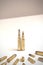 A couple of bullets standing in front of several other bullets of various calibers. It works as a concept for power, obedience, do