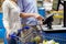 Couple buying food at grocery self-checkout