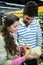 Couple buying goods in organic section