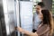 Couple Buying Refrigerator With Consumer Loan