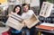 Couple are buying wooden boxes for house decoration