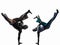 Couple capoeira dancers dancing silhouette