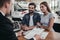 Couple at car dealership