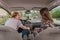 Couple in car setting air conditioning