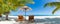 Couple chairs together by the sea banner. Summer romantic holiday honeymoon. Tropical island landscape.