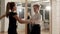 Couple of children rehearsing samba or rumba dance in dancing school. Confident talented Caucasian boy and girl dancing