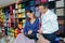 Couple choosing towels in shop