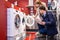 Couple Choosing Washing Machine At Hypermarket