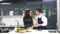 Couple chopped vegetables for the boyfriend in the kitchen. Young couples are helping to chop vegetables in the kitchen. Asian cou