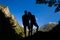 Couple climbers or hikers celebrating inspirational landscape