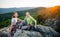 Couple of climbers resting and enjoying beautiful nature view