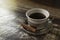 Couple of colorful coffee cups over a black and white table