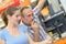 Couple contemplating purchase in hardware store