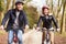 Couple On Cycle Ride In Winter Countryside