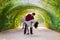 Couple dance in the green tunnel